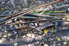 A LARGE COLLECTION OF GARDEN TOOLS including forks, rakes, spades, rakes, etc (20+