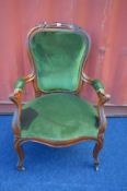 A VICTORIAN MAHOGANY ARMCHAIR with open armrests (the item in this lot is the remanence of a fire