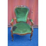 A VICTORIAN MAHOGANY ARMCHAIR with open armrests (the item in this lot is the remanence of a fire