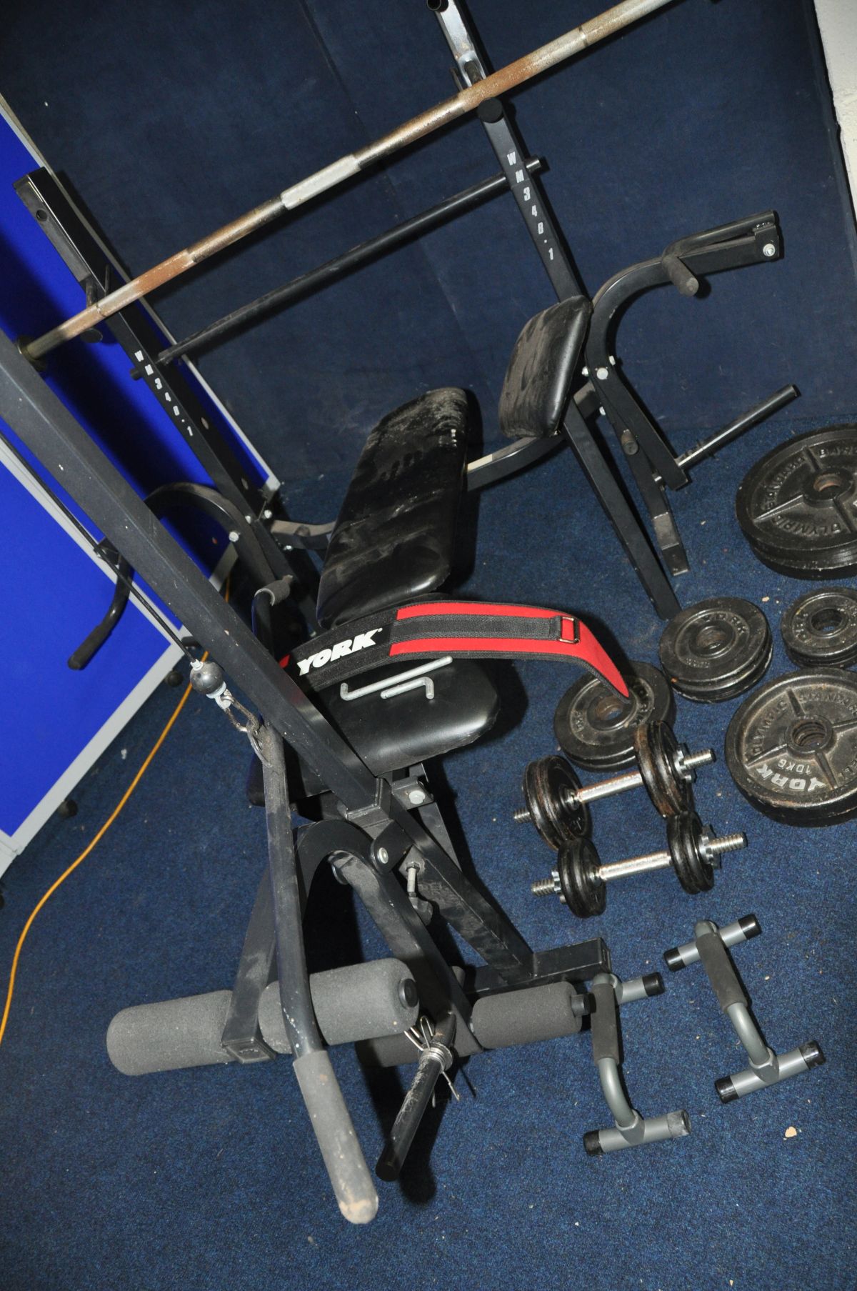 A MARCY WM348-1 WEIGHT BENCH with an Olympic bar, sixteen York Olympic Standard Barbells (2 at - Image 2 of 7