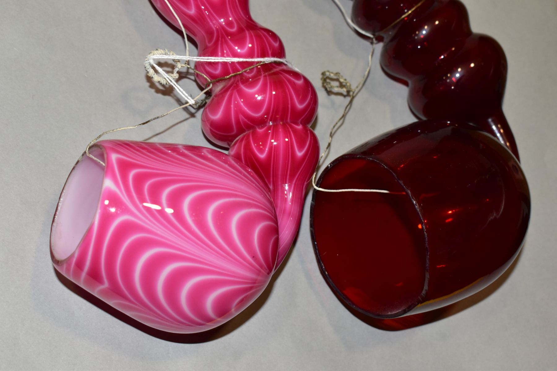 TWO 19TH CENTURY COLOURED GLASS OVERSIZED PIPES, one in ruby glass, the other in opaque pink with - Image 8 of 15