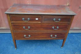 AN EDWARDIAN MAHOGANY AND STRUNG CHEST OF TWO OVER TWO LONG DRAWERS, width 106cm x depth 46cm x