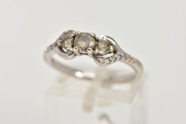 A WHITE METAL GEM AND DIAMOND RING, designed with a central circular cut colourless stone assessed