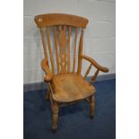 A BEECH WINDSOR ARMCHAIR (Sd) (the item in this lot is the remanence of a fire damaged property)