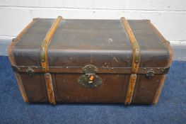 A VINTAGE WOODEN BOUNDED TRAVELLING TRUNK, with an internal tray, width 71cm x depth 47cm x height