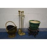 A BRASS THREE PIECE COMPANION SET, with a matching stand, a brass coal bucket, glazed planter and an