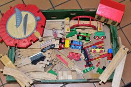 A QUANTITY OF UNBOXED AND ASSORTED BRIO & ELC WOODEN PUSH ALONG TRAINS, TRACK AND ACCESSORIES