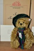 A BOXED STEIFF LIMITED EDITION SCOTTISH BEAR, blonde mohair, fully jointed, height 30cm, dressed