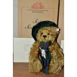 A BOXED STEIFF LIMITED EDITION SCOTTISH BEAR, blonde mohair, fully jointed, height 30cm, dressed