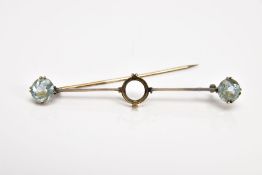 AN AQUAMARINE BAR BROOCH, designed as a circular aquamarine either end of a knife edge bar brooch,