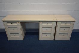 A MODERN BEECH DRESSING TABLE with six drawers, width 153cm x depth 48cm x height 71cm and a three