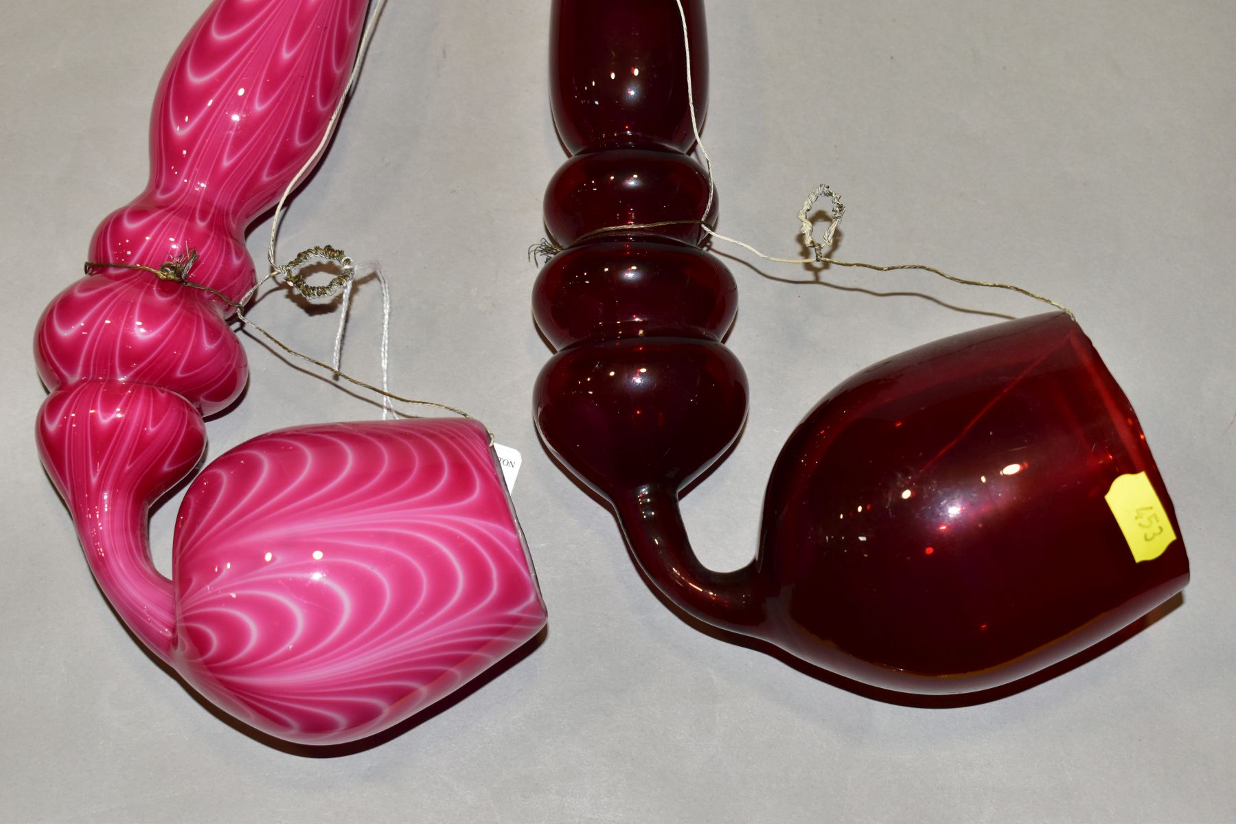 TWO 19TH CENTURY COLOURED GLASS OVERSIZED PIPES, one in ruby glass, the other in opaque pink with - Image 2 of 15
