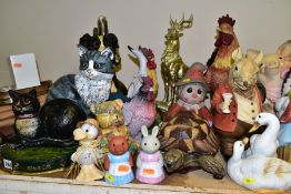 A QUANTITY OF ANIMAL ORNAMENTS to include more than twenty five animal figures, three cast iron