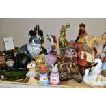 A QUANTITY OF ANIMAL ORNAMENTS to include more than twenty five animal figures, three cast iron