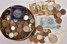 A TIN OF MIXED COINS to include a carded five pound coin etc