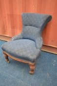 A LATE VICTORIAN OAK SCROLL BACK CHAIR on metal casters (the item in this lot is the remanence of