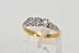 A MID TO LATE TWENTIETH CENTURY THREESTONE DIAMOND RING. Three round brilliant cut diamonds claw set