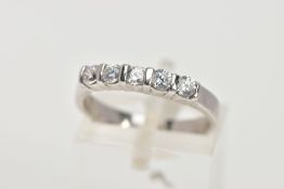 A 9CT WHITE GOLD HALF ETERNITY RING, designed with a row of five circular cut colourless cubic