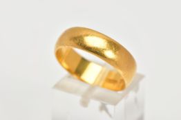 A 22CT GOLD WEDDING BAND, a D shaped cross section band, measuring approximately 6.3mm in width,