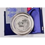 A SILVER COMMEMORATIVE PLATE, the circular plate with engraved image of Queen Elizabeth II and