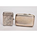 A SILVER CIGARETTE CASE AND A VESTA, the cigarette case of a rounded rectangular form, engine turned