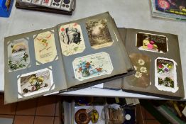 POSTCARDS, two albums containing approximately four hundred and sixty five sentimental postcards