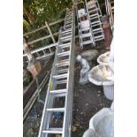 TWO SETS OF ALUMINIUM DOUBLE EXTENSION LADDERS, one set by Timballoy ladder co ltd 3m closed 5.22m