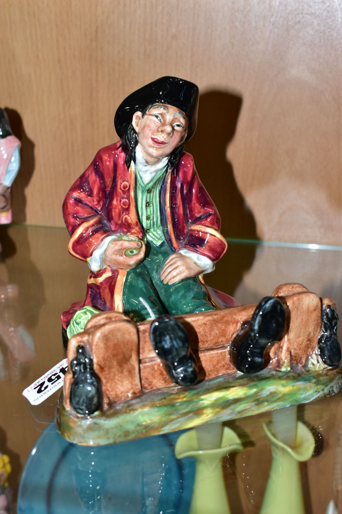 A ROYAL DOULTON FIGURE, In The Stocks HN2163, approximate height 14.5cm (condition: dusty but