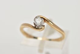 A YELLOW METAL DIAMOND SOLITAIRE, designed with a six-claw set, round brilliant cut diamond, stamped