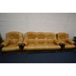 AN ITALIAN STYLE BROWN LEATHER AND WOODEN FRAMED THREE PIECE LOUNGE SUITE, comprising a sofa, length