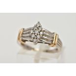 A 9CT GOLD CUBIC ZIRCONIA SET DRESS RING, designed with a marquise shape cluster, set with