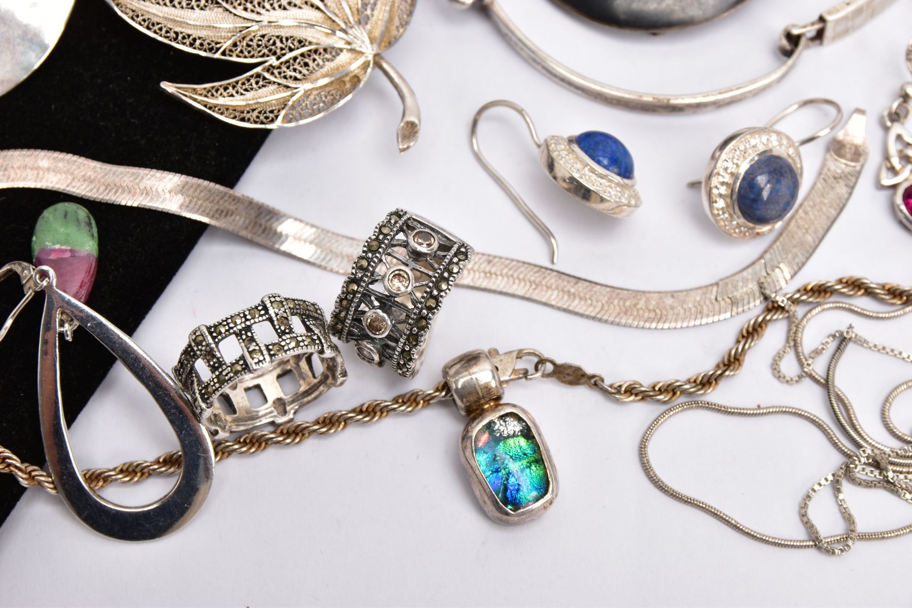 A BAG OF ASSORTED SILVER AND WHITE METAL JEWELLERY, to include a silver bangle, fitted with a mother - Image 3 of 4