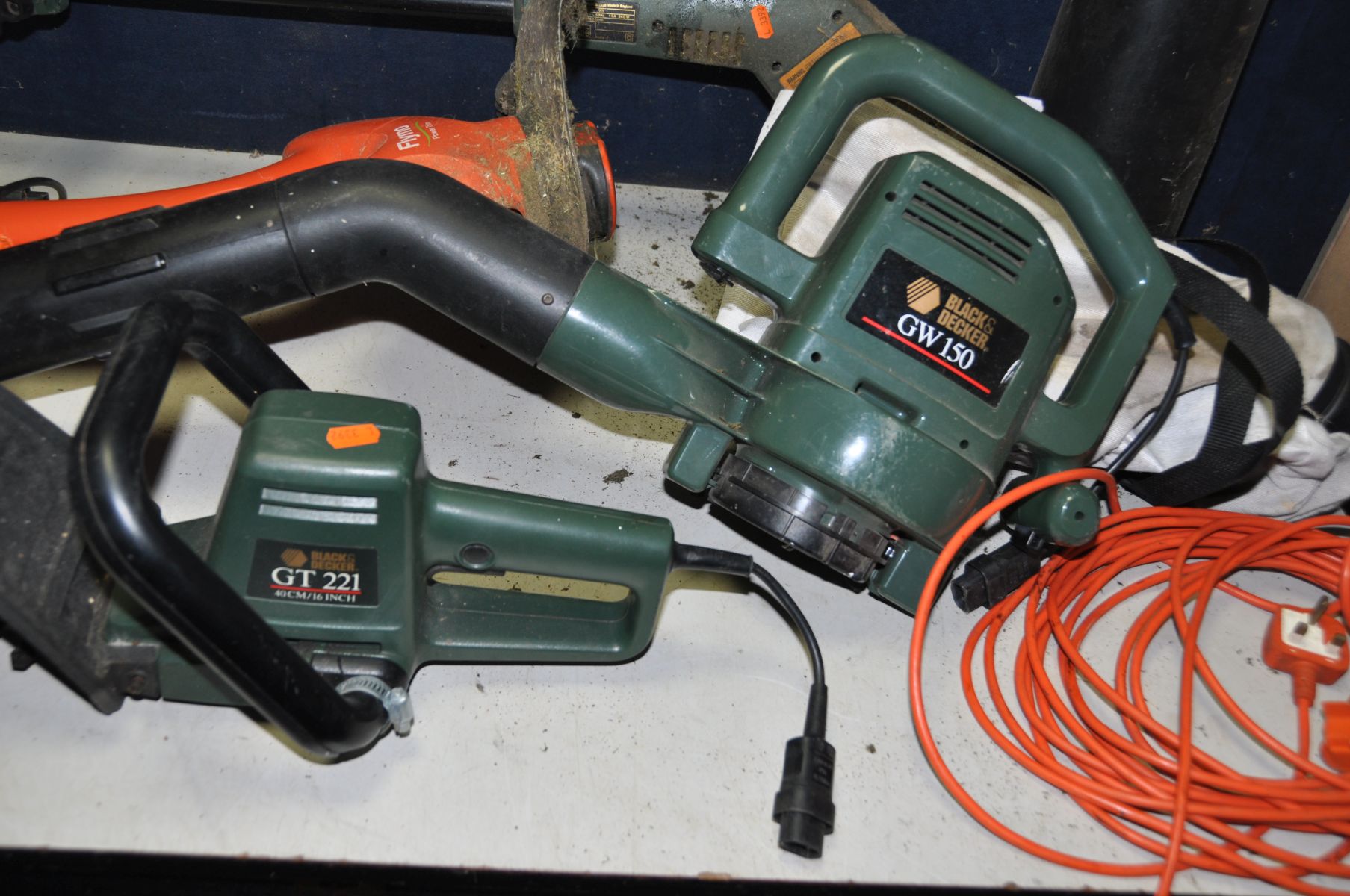 A FLYMO POWER TRIM STRIMMER and three Black and Decker garden tools with one cable comprising a - Image 2 of 3