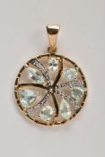 A 9CT GOLD AQUAMARINE AND DIAMOND SET PENDANT, of an openwork circular form, set with vary cut