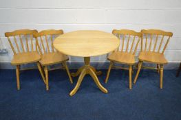 A MODERN BEECH CIRCULAR KITCHEN TABLE, diameter 89cm x height 76cm and four chairs (5)