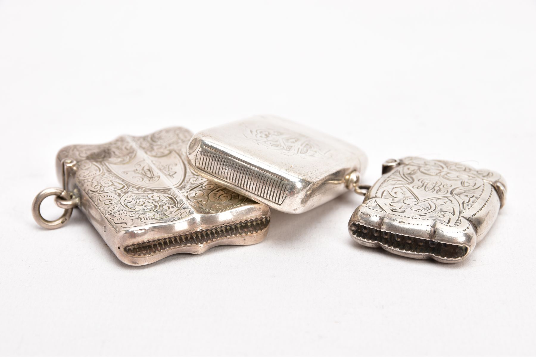 TWO LATE VICTORIAN SILVER VESTAS, AN EARLY 20TH CENTURY VESTA, AND A SMALL CERAMIC FIGURE, the first - Image 4 of 5