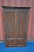 A GEORGIAN MAHOGANY PANELLED TWO DOOR CUPBOARD, width 110cm x depth 37cm x height 182cm (the item in