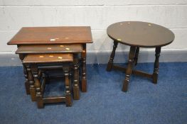 AN REPRODUCTION OAK NEST OF THREE TABLES, along with a circular oak occasional table (2)
