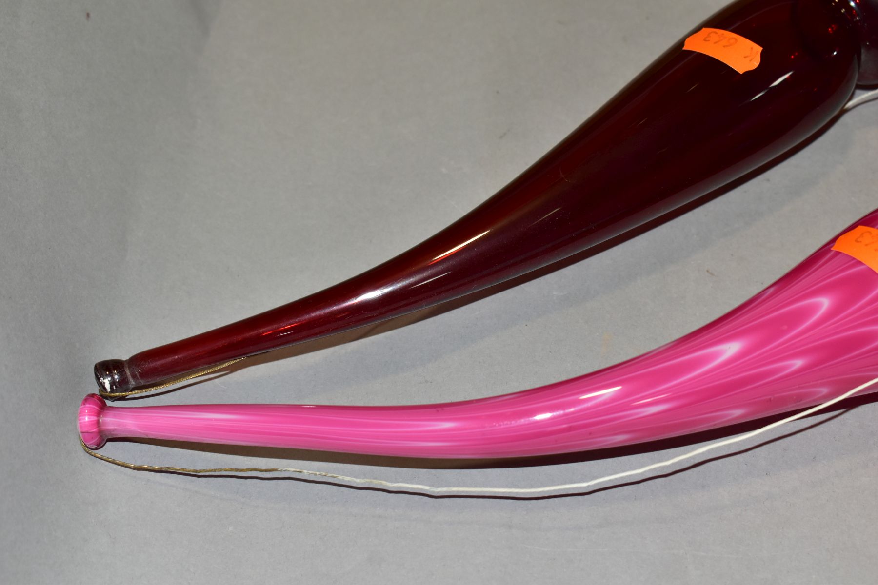 TWO 19TH CENTURY COLOURED GLASS OVERSIZED PIPES, one in ruby glass, the other in opaque pink with - Image 11 of 15