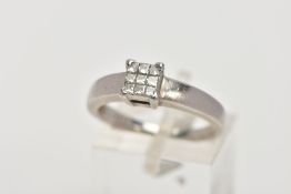 A PLATINUM DIAMOND RING, designed with a square cluster of nine princess cut diamonds, stamped