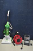 A HOOVER HURRICANE UPRIGHT VACUUM CLEANER, a Halfords Battery Charger and an extension reel (all PAT