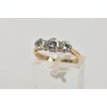 A 15CT GOLD AND PLATINUM, THREE STONE DIAMOND RING, designed with three claw set, round brilliant