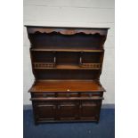 AN OAK OLD CHARM SIDEBOARD with a later added top, width 136cm x depth 44cm x height 184cm x