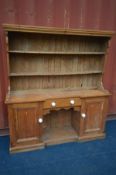 A VICTORIAN PINE DRESSER, with a later top, width 168cm x depth 43cm x height 182cm (the item in