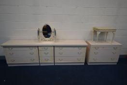 A CREAM FRENCH DRESSING TABLE/CHEST OF DRAWERS SET, comprising three chest of three long drawers,