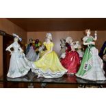 SEVEN ROYAL DOULTON LADY FIGURES AND A LEONARDO FIGURE, comprising 'Merry Christmas' HN3096, '