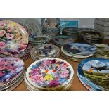 APPROXIMATELY SEVENTY FIVE COLLECTORS PLATES, themes to include birds, dogs, flowers, Oriental