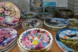 APPROXIMATELY SEVENTY FIVE COLLECTORS PLATES, themes to include birds, dogs, flowers, Oriental