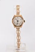 A 9CT GOLD EVERITE LADY'S WRISTWATCH, round dial measuring approximately 18mm in diameter, Arabic