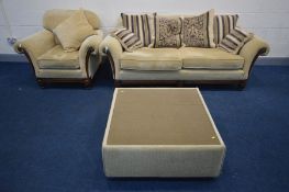 A FRENCH STYLE WOODEN AND UPHOSTERED THREE PIECE LOUNGE SUITE, comprising a large sofa with